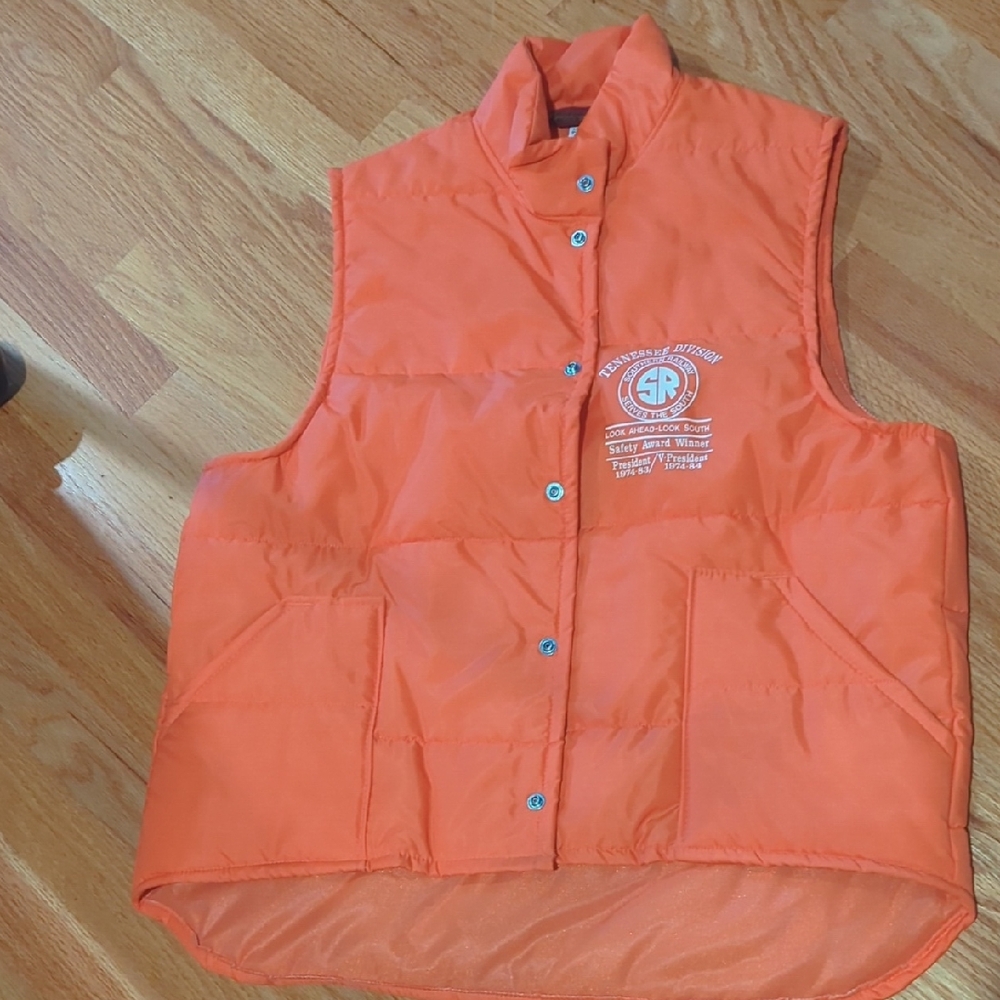 Orange Puffer Vest with Railroad Logo